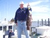 4-20 - Dave with an 8 1/4 pound tog caught while wreckfishing.