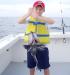 9-4 - 9-year old Shane proudly displays his 4½ pound sea bass.
